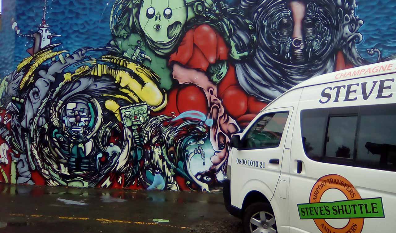 Steve Van with mural photo