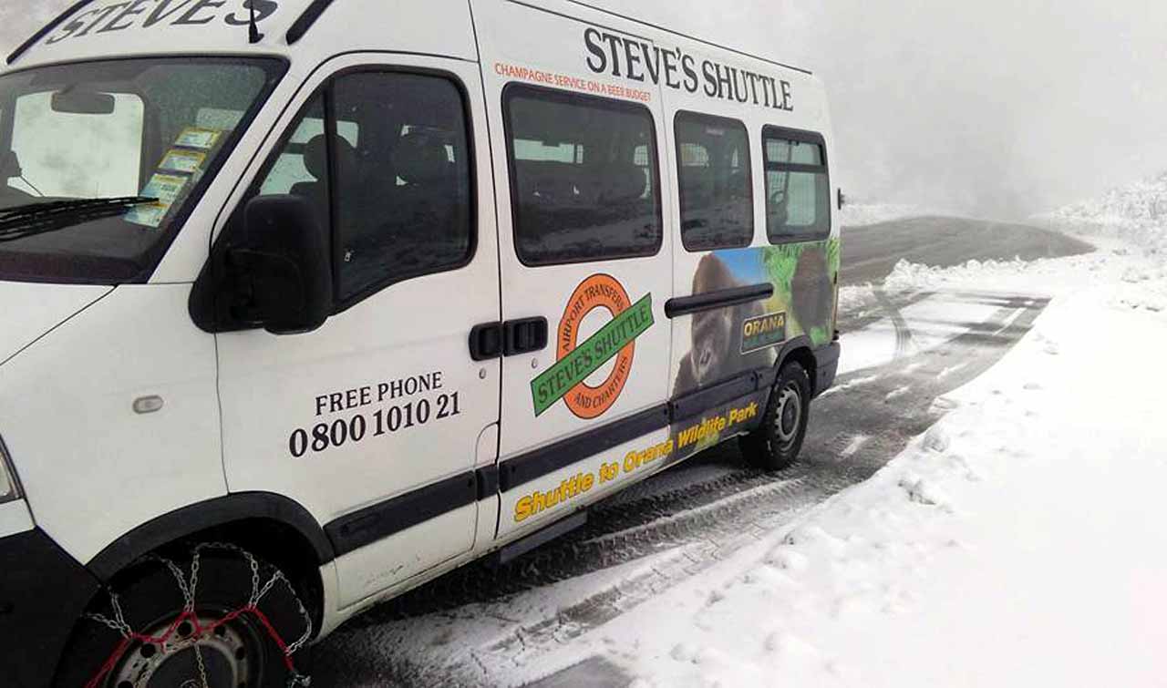 Van on snowy road Photo
